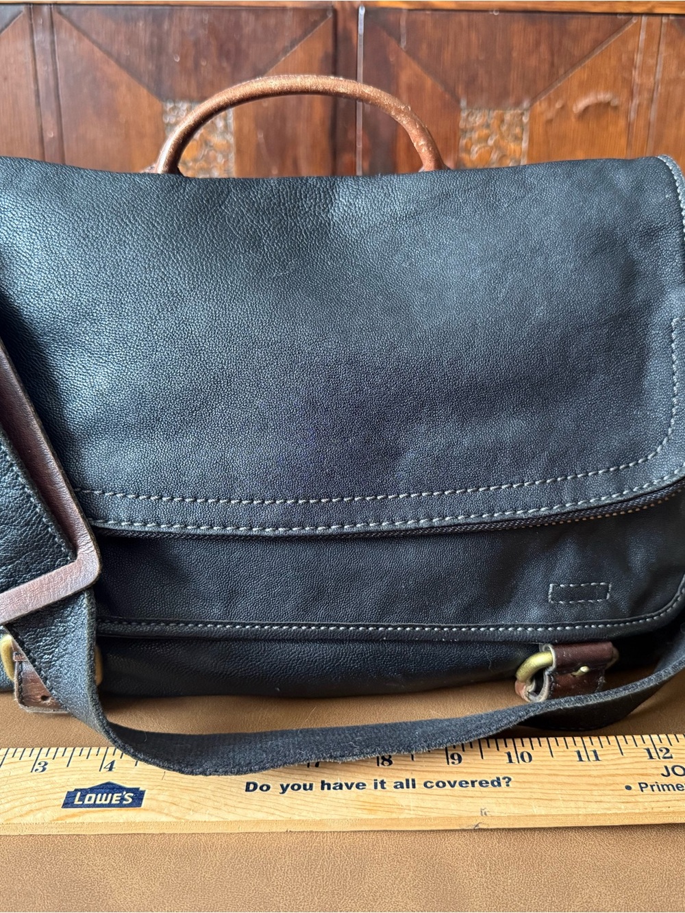 Fossil Black Leather Messenger Bag with Brown Accents